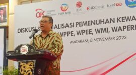 Ketua Umum PROPAMI NS Aji Martono saat memberikan sambutan pada acara OJK Sosialisasi Pemenuhan Kewajiban Perizinan WPPE, WPEE, WMI, dan WAPERD untuk Menguatkan Integritas Pasar Modal Indonesia. (Doc.Ist)